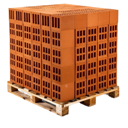 High solid concrete blocks stacked on a wooden pallet at a Ugandan construction site