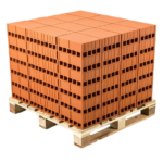 High solid concrete blocks stacked on a wooden pallet at a Ugandan construction site